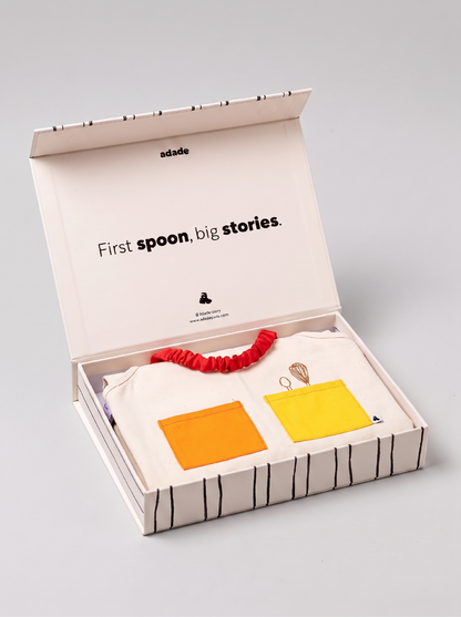 Box ADADE à colorier, décorée de rayures et d’illustrations de fruits et légumes en noir et blanc, pour une activité créative avec les enfants.