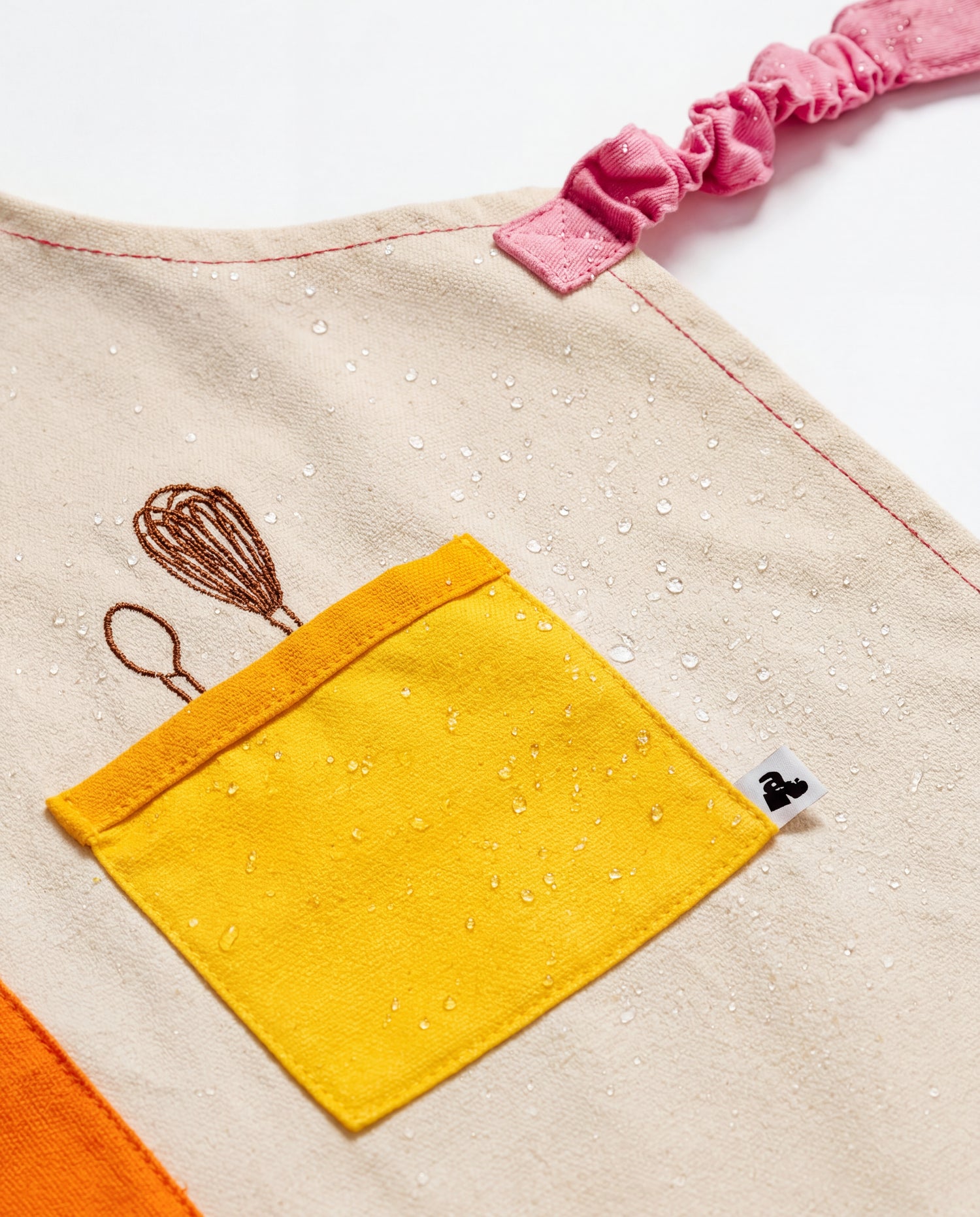 tablier pour enfant déperlant avec broderie